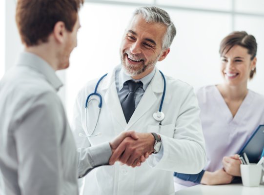 doctor doing a handshake