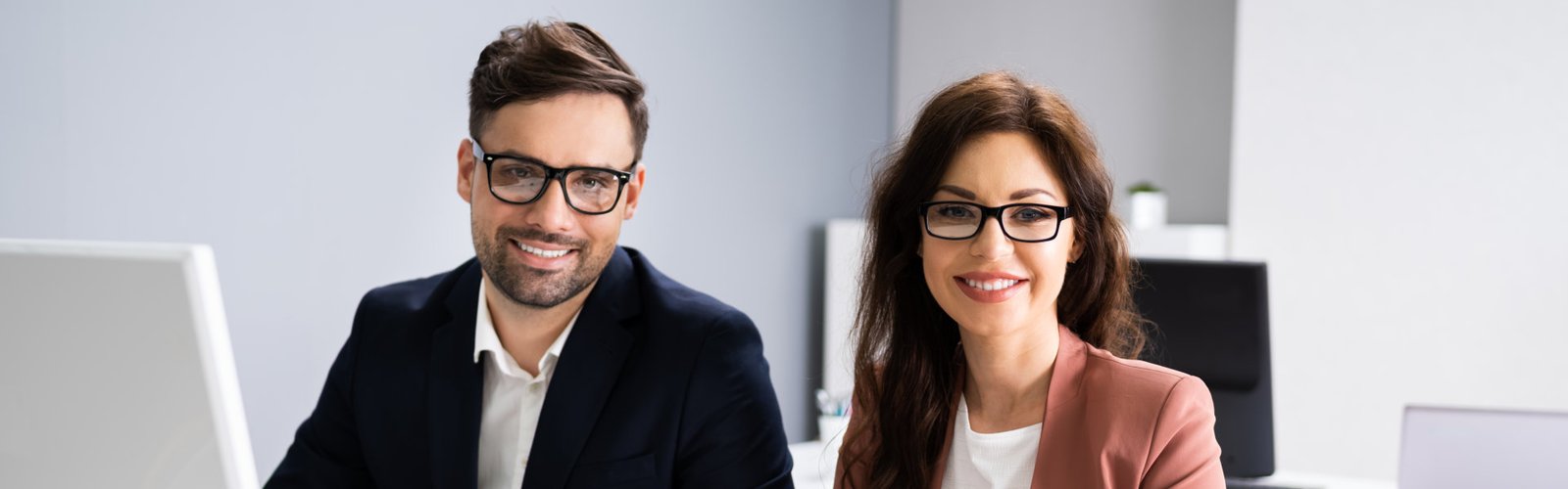 man and woman smiling
