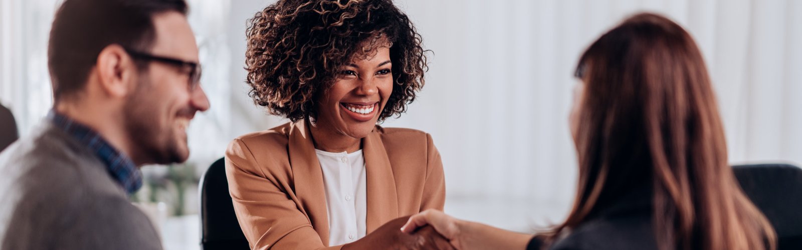 woman doing a handshake